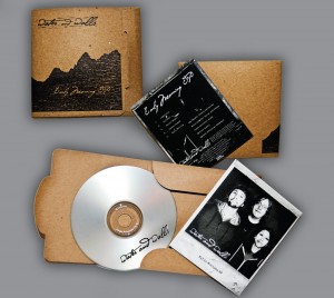 Eco friendly album artwork made of fully recyclable materials including water based inks, repurposed paper and cardboard.